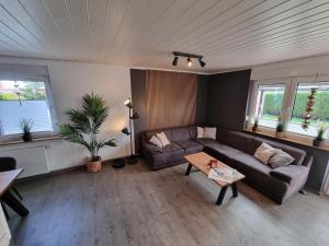 Ein Sitzbereich in der Unterkunft Ferienhaus Ohrenqualle