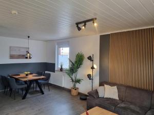 Ein Sitzbereich in der Unterkunft Ferienhaus Ohrenqualle