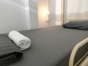 Postel nebo postele na pokoji v ubytování Bandlive Backpacker Hostel