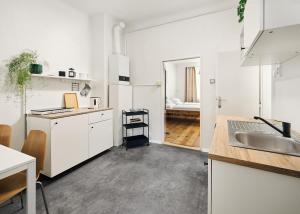 Kuchyň nebo kuchyňský kout v ubytování Teytz Apartments + 20 fotografií