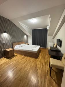 Voodi või voodid majutusasutuse Apartments Philip II toas
