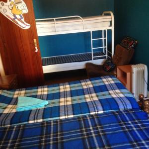 Cama ou camas em um quarto em Covilhã Hostel