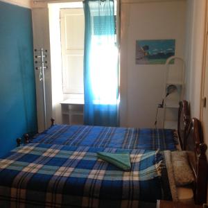 Cama ou camas em um quarto em Covilhã Hostel