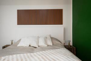 Ένα ή περισσότερα κρεβάτια σε δωμάτιο στο Saarihovi