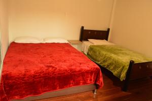 Ένα ή περισσότερα κρεβάτια σε δωμάτιο στο Hostal Juan Páramo