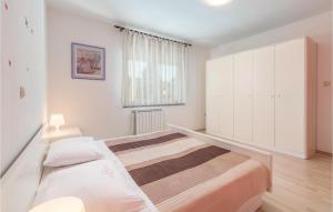 Postel nebo postele na pokoji v ubytování Holiday Home Mirka
