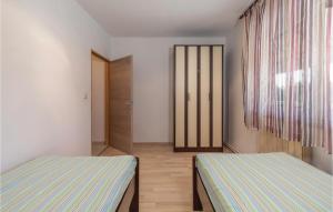 Postel nebo postele na pokoji v ubytování Holiday Home Mirka