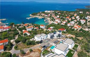 an aerial view of a small town next to the water at Vila Del Sol in Lun +37 photos