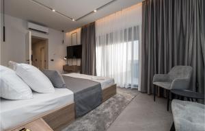 Posteľ alebo postele v izbe v ubytovaní Cozy Home In Lun With Sauna