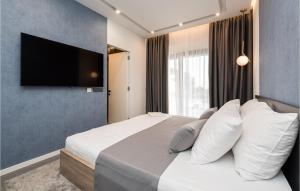 Posteľ alebo postele v izbe v ubytovaní Cozy Home In Lun With Sauna