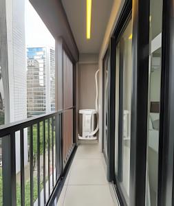 a balcony with a view of a building at NOVO Skylux 1109 Imponente com Piscina Aquecida WIFI in Rio de Janeiro
