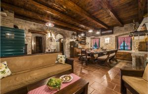 a living room with a couch and a table at Villa Sisman in Donji Zemunik +36 photos