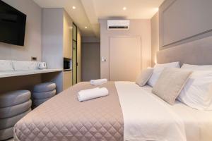Katil atau katil-katil dalam bilik di Good Grace Apartments