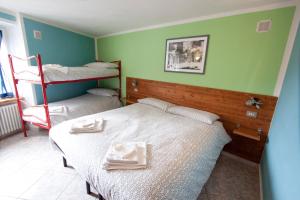 Postel nebo postele na pokoji v ubytování Residence Arvinei