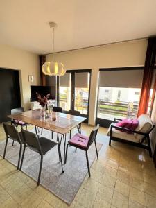 a dining room with a table and chairs at Villa Marie in Baška Voda