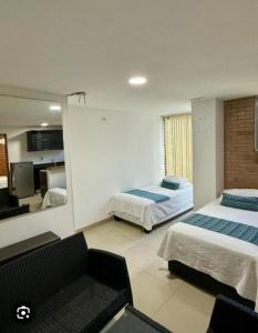 Katil atau katil-katil dalam bilik di Hotel y Apartamentos Montes +4 gambar