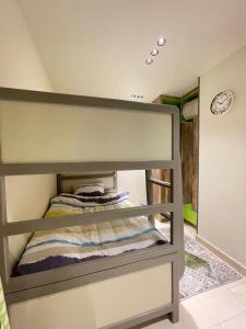 a bedroom with a bunk bed in a room at Luxury Studio House 392-2 in 6th Of October