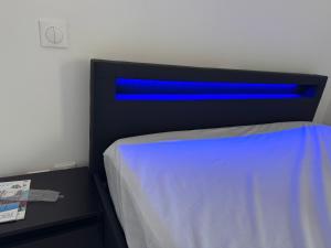 Ένα ή περισσότερα κρεβάτια σε δωμάτιο στο Royal appart city 4