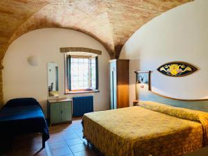 Posteľ alebo postele v izbe v ubytovaní Bed & Breakfast Casale Gregoriano