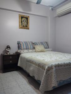 Ένα ή περισσότερα κρεβάτια σε δωμάτιο στο La Mary Tucuman