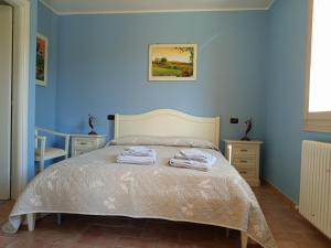 Letto o letti in una camera di Agriturismo La Palazzina di Gorgognano