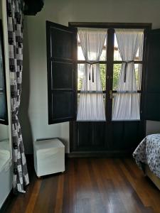 A bed or beds in a room at Mayorazgo De Altamira Mila