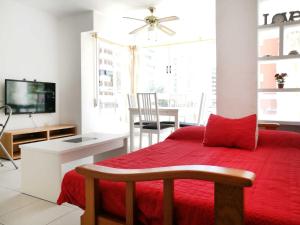 TV a/nebo společenská místnost v ubytování Playaymar