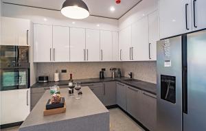 Η κουζίνα ή μικρή κουζίνα στο Nice Home In Celina With Sauna