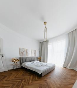 Katil atau katil-katil dalam bilik di Evo Residence Oasului