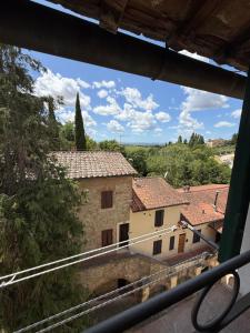 a view from the balcony of a building at Il Nido di Fede e Romy in Castelnuovo Berardenga