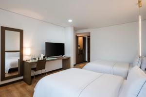 Μια τηλεόραση ή/και κέντρο ψυχαγωγίας στο Hotel Poblado Alejandria