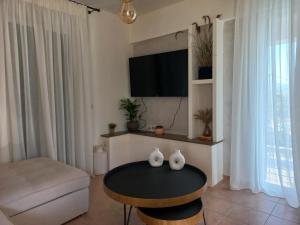 Μια τηλεόραση ή/και κέντρο ψυχαγωγίας στο Ιφιγένεια