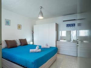 Кровать или кровати в номере Velvet Sunset Penthouse
