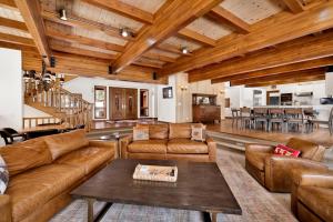 a living room with leather couches and a table at Bear Lake Lodge #2547 in Big Bear Lake +42 photos