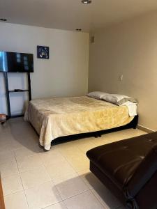 Ένα ή περισσότερα κρεβάτια σε δωμάτιο στο Exclusivo apartamento bien ubicado