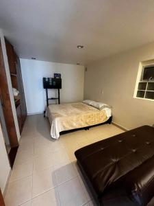 Ένα ή περισσότερα κρεβάτια σε δωμάτιο στο Exclusivo apartamento bien ubicado