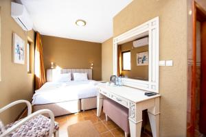 Postel nebo postele na pokoji v ubytování New Hotel Kuč By Marvel