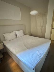 Uma cama ou camas num quarto em belle vue appartement al hoceima