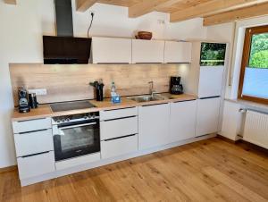 Kuchyň nebo kuchyňský kout v ubytování Gästehaus Philipp