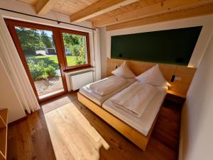 Postel nebo postele na pokoji v ubytování Gästehaus Philipp