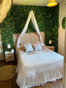 Postel nebo postele na pokoji v ubytování Maison troglodyte aux Eyzies Périgord