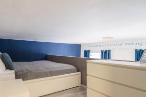 Postel nebo postele na pokoji v ubytování happy home BLUE