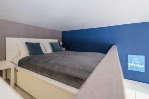 Postel nebo postele na pokoji v ubytování happy home BLUE