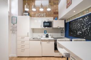 Kuchyň nebo kuchyňský kout v ubytování happy home BLUE + 28 fotografií