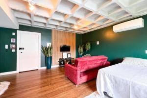 Кровать или кровати в номере Loft Luna Blumenau +9 фотографий
