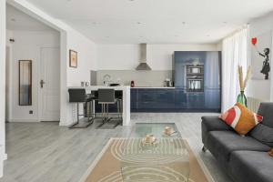 Η κουζίνα ή μικρή κουζίνα στο Charmant appt 1BR 2P Neuilly-sur-Seine