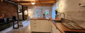 a kitchen with a sink and a counter top at Old Mill in Slavsko Polje