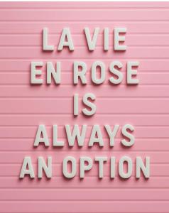 a pink wall with the words la velez en rose is always an option at La Vie en Rose in Verviers