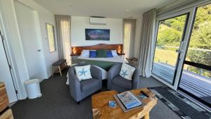 Voodi või voodid majutusasutuse View With A Room NZ - Boutique Beachfront Accommodation on the Great Coast Road toas