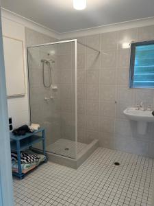 a bathroom with a shower and a sink at Apartment in great location Murray Street in North Ward